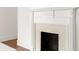Close-up of decorative white fireplace in a neutral colored home at 1585 S Ponce De Leon Ne Ave # 19, Atlanta, GA 30307