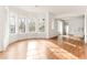 Bright living room boasts gleaming hardwood floors and large bay windows, flooding the space with natural light at 1585 S Ponce De Leon Ne Ave # 19, Atlanta, GA 30307