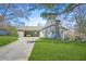 Attractive single-Gathering house showcasing a carport, neat landscaping, and a welcoming facade at 200 Harvell Dr, Bowdon, GA 30108