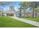 The home features a long driveway and well maintained lawn at 200 Harvell Dr, Bowdon, GA 30108