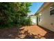 Spacious backyard with mature trees, offering plenty of room for activities at 407 Red Coat Ln, Woodstock, GA 30188