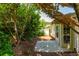 Private backyard with a concrete patio, perfect for outdoor dining and relaxation at 407 Red Coat Ln, Woodstock, GA 30188