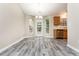 Cozy dining area featuring a chandelier and stainless steel dishwasher at 407 Red Coat Ln, Woodstock, GA 30188
