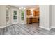 Dining area featuring stainless steel appliances and lots of windows at 407 Red Coat Ln, Woodstock, GA 30188