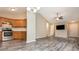 Open floor plan features a spacious living room and kitchen area at 407 Red Coat Ln, Woodstock, GA 30188