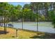 Community amenities include a well-maintained tennis court and playground at 407 Red Coat Ln, Woodstock, GA 30188