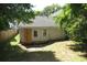 Backyard view of exterior featuring covered window at 490 Culberson Sw St, Atlanta, GA 30310