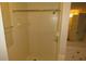 Bathroom featuring tiled shower and large tub, providing a relaxing space at 490 Culberson Sw St, Atlanta, GA 30310
