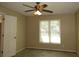 Bedroom featuring a standard ceiling fan and a window at 490 Culberson Sw St, Atlanta, GA 30310