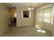 Open dining area with a bay window and chandelier at 490 Culberson Sw St, Atlanta, GA 30310