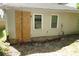 Backyard view of home undergoing foundation repairs at 490 Culberson Sw St, Atlanta, GA 30310