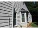 Exterior detail of siding, bay window, and trim at 490 Culberson Sw St, Atlanta, GA 30310