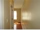Hallway featuring hardwood floors, view to a window, and neutral walls at 490 Culberson Sw St, Atlanta, GA 30310