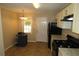 Traditional kitchen features tile flooring and essential appliances at 490 Culberson Sw St, Atlanta, GA 30310