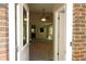 Sunlit Living Room featuring ceiling fan viewed through doorway at 490 Culberson Sw St, Atlanta, GA 30310