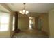 Bright living space with fireplace, chandelier, and natural light at 490 Culberson Sw St, Atlanta, GA 30310