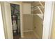 Small utility room with shelving and water heater at 490 Culberson Sw St, Atlanta, GA 30310