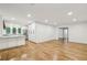 Open concept floor plan featuring hardwood floors that connect kitchen and dining area at 11540 Northgate Way, Roswell, GA 30075