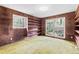 Bedroom with unique textured walls and built-in shelves with dual bright windows at 1725 Timberland Ne Rd, Atlanta, GA 30345