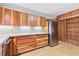 Spacious kitchen offering ample counter space, wood cabinets, and stainless steel refrigerator at 1725 Timberland Ne Rd, Atlanta, GA 30345