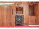 Antique-style vault integrated in the wood paneled walls, offering unique storage at 1725 Timberland Ne Rd, Atlanta, GA 30345
