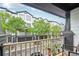 Cozy covered balcony with a scenic view of the neighborhood's modern townhome facades at 215 Semel Nw Dr # 455, Atlanta, GA 30309