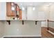 Kitchen area featuring granite countertops, stainless steel appliances, and a bar-top eating area with pendant lights at 215 Semel Nw Dr # 455, Atlanta, GA 30309