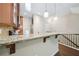 Kitchen with stainless steel appliances, granite counters, and a breakfast bar perfect for casual dining and entertaining at 215 Semel Nw Dr # 455, Atlanta, GA 30309
