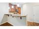 Kitchen area featuring granite countertops, stainless steel appliances, and a bar-top, enhancing the space's functionality at 215 Semel Nw Dr # 455, Atlanta, GA 30309