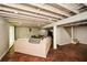 Basement with painted ceiling, concrete floor and a stairwell at 2840 Wendy Ln, Marietta, GA 30062
