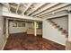 Basement area featuring concrete floors, painted ceilings, and stairwell at 2840 Wendy Ln, Marietta, GA 30062