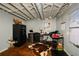 This basement room features an open ceiling and a number of stored items at 2840 Wendy Ln, Marietta, GA 30062