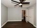 Bedroom featuring a ceiling fan, closet, and updated floors for a relaxing atmosphere at 2840 Wendy Ln, Marietta, GA 30062