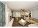Spacious living room featuring wood floors, fireplace, and lots of natural light at 2840 Wendy Ln, Marietta, GA 30062