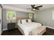 Spacious main bedroom with hardwood floors, ceiling fan, and lots of natural light at 2840 Wendy Ln, Marietta, GA 30062