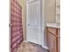 Bathroom with vanity, sink, cabinets, and open shelving for storage at 319 Franklin Ln, Acworth, GA 30102