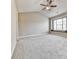 Bedroom features neutral paint, vaulted ceiling, large windows, and plush carpet at 319 Franklin Ln, Acworth, GA 30102