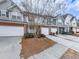 Charming townhomes boast attached garages and manicured landscaping, perfect for comfortable suburban living at 319 Franklin Ln, Acworth, GA 30102