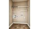 Laundry room features tile floor and hookups for washer and dryer at 319 Franklin Ln, Acworth, GA 30102