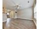 This spacious living room offers beautiful floors and a ceiling fan; an inviting space to relax and enjoy at 319 Franklin Ln, Acworth, GA 30102