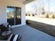 Inviting back porch with plush seating, perfect for enjoying the serene backyard and outdoor relaxation at 3552 Cedarvale Ct, Powder Springs, GA 30127