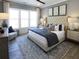 Serene main bedroom with large windows, plush bedding, and stylish decor at 3552 Cedarvale Ct, Powder Springs, GA 30127