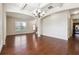 Open-concept space featuring hardwood floors and ample natural light at 5705 Aspen Dr, Cumming, GA 30040