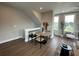 Bright open floor plan with kitchen and living area, hardwood floors, and modern finishes at 968 Bibbs Circle Nw, Atlanta, GA 30318