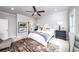 Spacious bedroom featuring a ceiling fan, neutral decor, and plenty of natural light at 1417 Coretta Scott Bnd, Atlanta, GA 30318