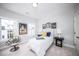 Cozy bedroom with natural light, stylish decorations, and a comfortable seating area at 1417 Coretta Scott Bnd, Atlanta, GA 30318
