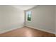 Well-lit bedroom with hardwood floors, offering a cozy and inviting space at 1417 Coretta Scott Bnd, Atlanta, GA 30318