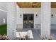 Inviting entrance with double doors and white-washed brick pillars at 1417 Coretta Scott Bnd, Atlanta, GA 30318