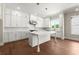 Bright kitchen with white cabinetry, stainless steel appliances, and center island at 1417 Coretta Scott Bnd, Atlanta, GA 30318