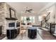 Bright and inviting living room with a stone fireplace at 1417 Coretta Scott Bnd, Atlanta, GA 30318
